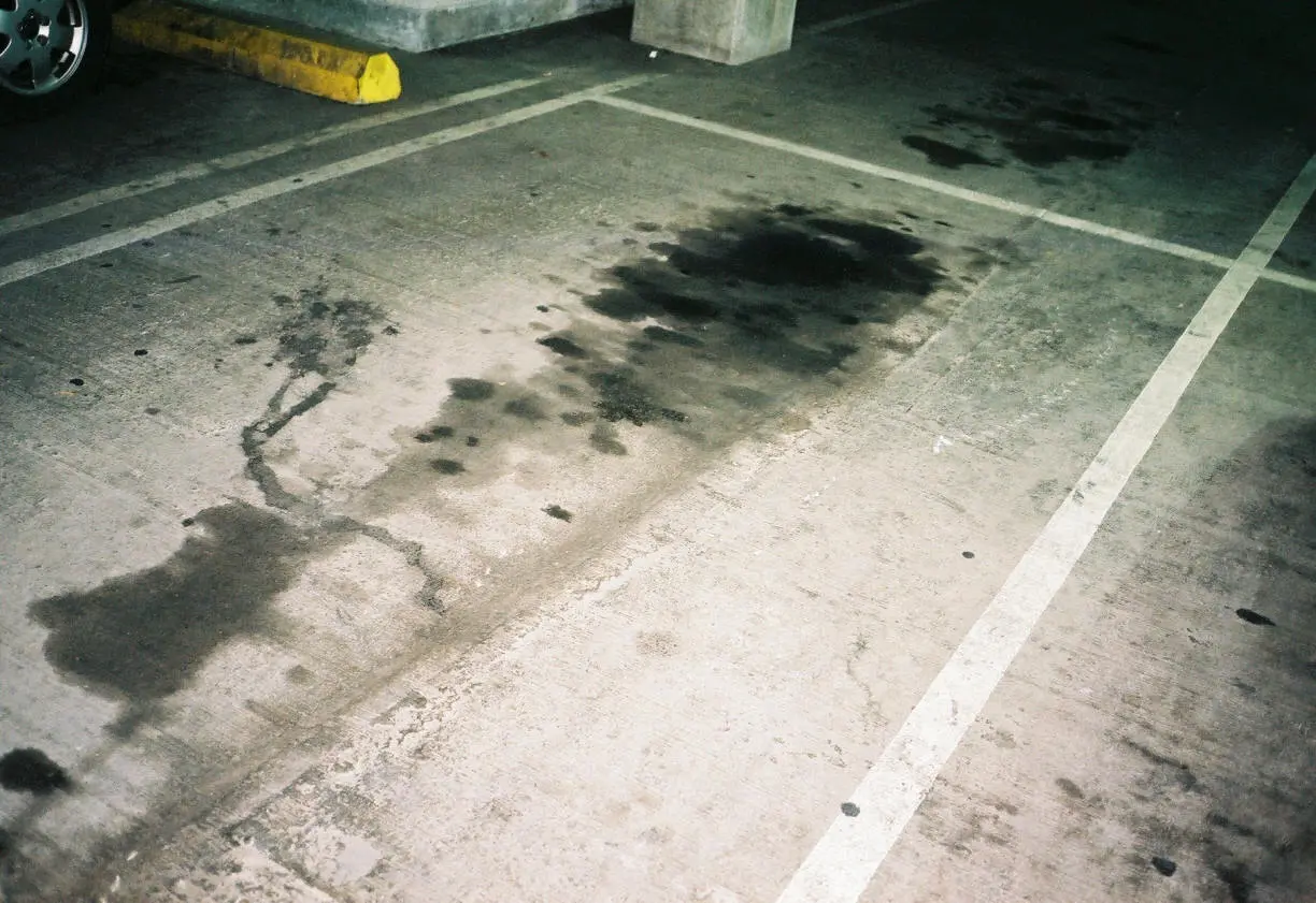 Oil-and-Sand-on-Parking-Garage-Floor